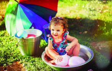 Backyard Water Fun.  By Amy Iori